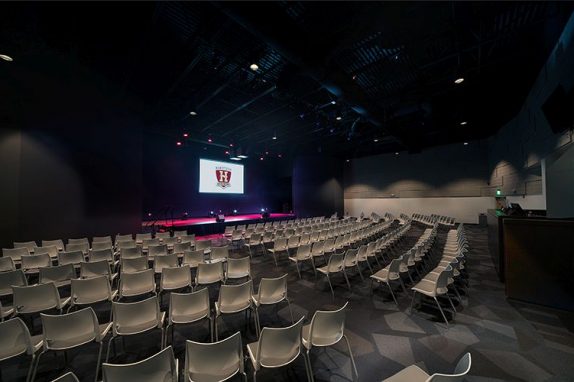 Interior photo of Hartfield Academy auditorium