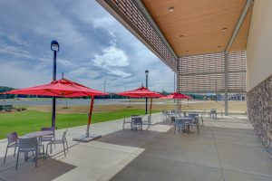 Exterior photo of Pinelake Reservoir student center patio
